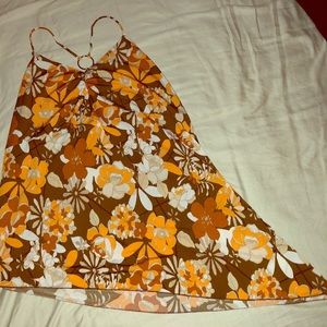 Bold floral asymmetrical tank